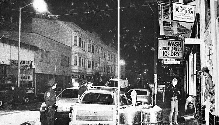 A black-and-white photo of a busy nighttime street scene with police officers and cars. A neon sign is partially visible.